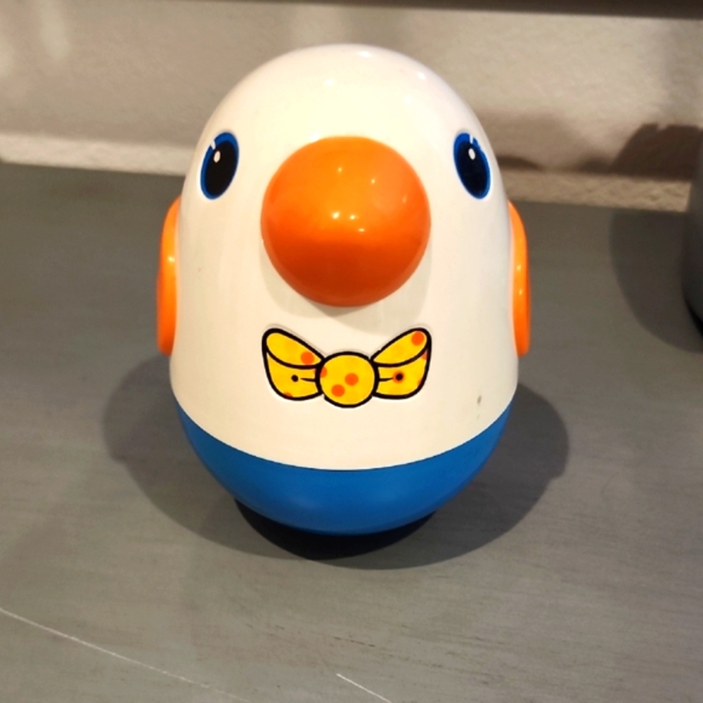 Vintage PLAYSCHOOLWeeble Wobble Colorful Toy Figure with Orange and Blue Accents